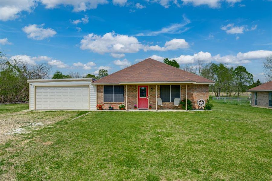 Exterior details and patio area of a home in , Powderly (Image 22).