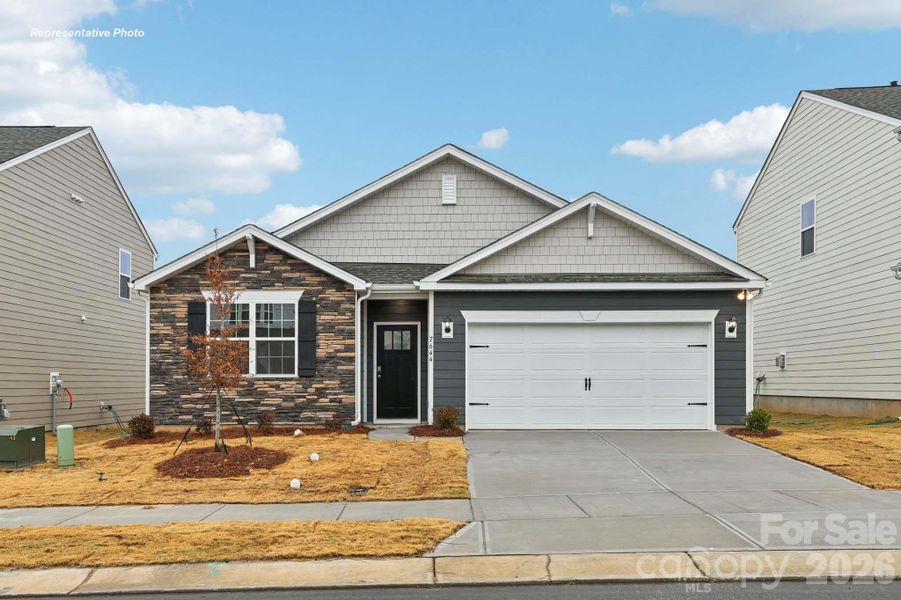 Front exterior of a new home in Laurelbrook, Sherrills Ford, NC, highlighting curb appeal (Image 1). Front exterior of a new home in Laurelbrook, Sherrills Ford, NC, highlighting curb appeal (Image 1).