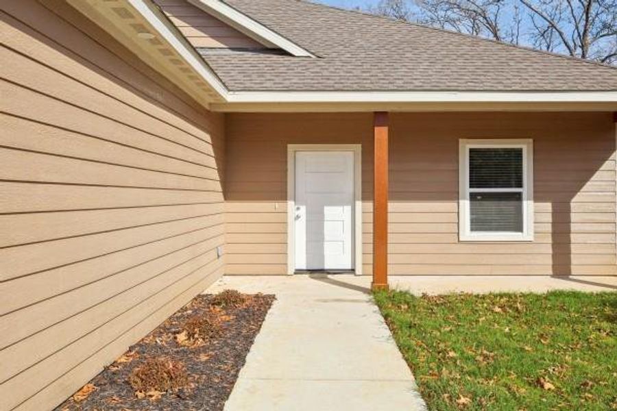 Welcoming entryway with a modern flair and pristine exterior, perfect for making memorable first impressions. Welcoming entryway with a modern flair and pristine exterior, perfect for making memorable first impressions.