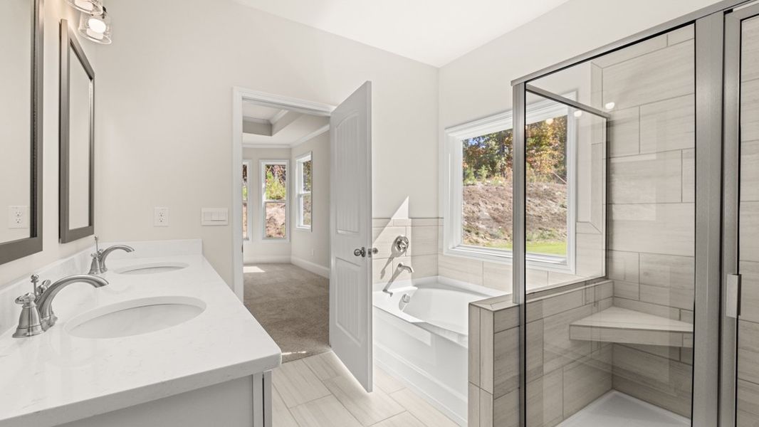 Representative furnished interior of a home built from the WINDSOR by D.R. Horton in Butner Estates, South Fulton (Image 18).