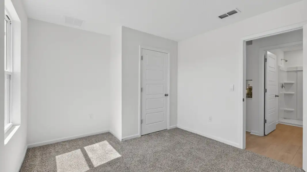 Spacious, unfurnished interior of a new home in The Arbors, Jacksonville (Image 20).