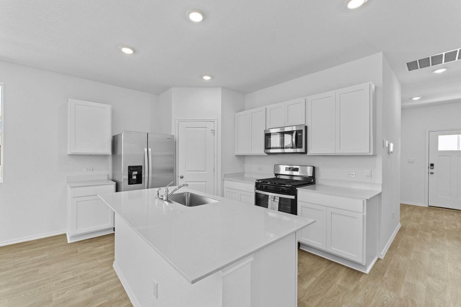 Furnished interior view inside a new home in Valverde, Bastrop (Image 14).