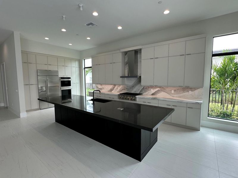 Furnished interior view inside a new home in Coral Isles at Avenir, Palm Beach Gardens (Image 12).