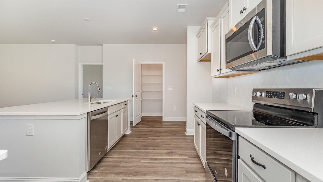 Furnished interior view inside a new home in The Cove at Mallard Crossing, Summerville (Image 8). Furnished interior view inside a new home in The Cove at Mallard Crossing, Summerville (Image 8).