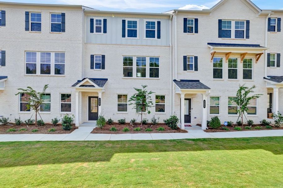 Front exterior of a new home in Somerset at Veterans Memorial, Mableton, GA, highlighting curb appeal (Image 2).