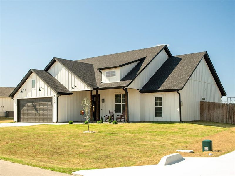 Front exterior of a new home in , Tolar, TX, highlighting curb appeal (Image 2). Front exterior of a new home in , Tolar, TX, highlighting curb appeal (Image 2).