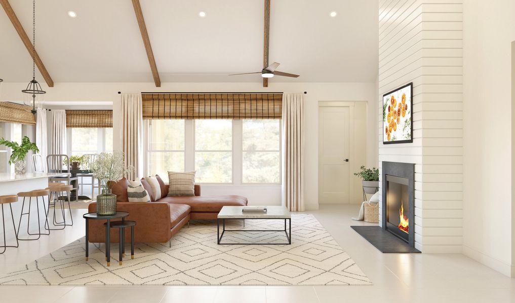 Great room with ceiling beams and fireplace