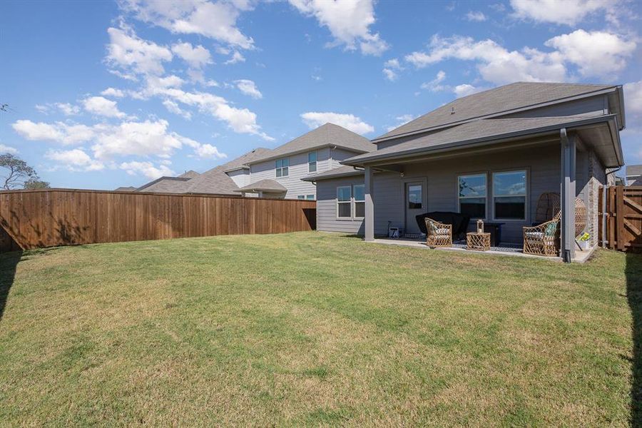 View of yard with a patio