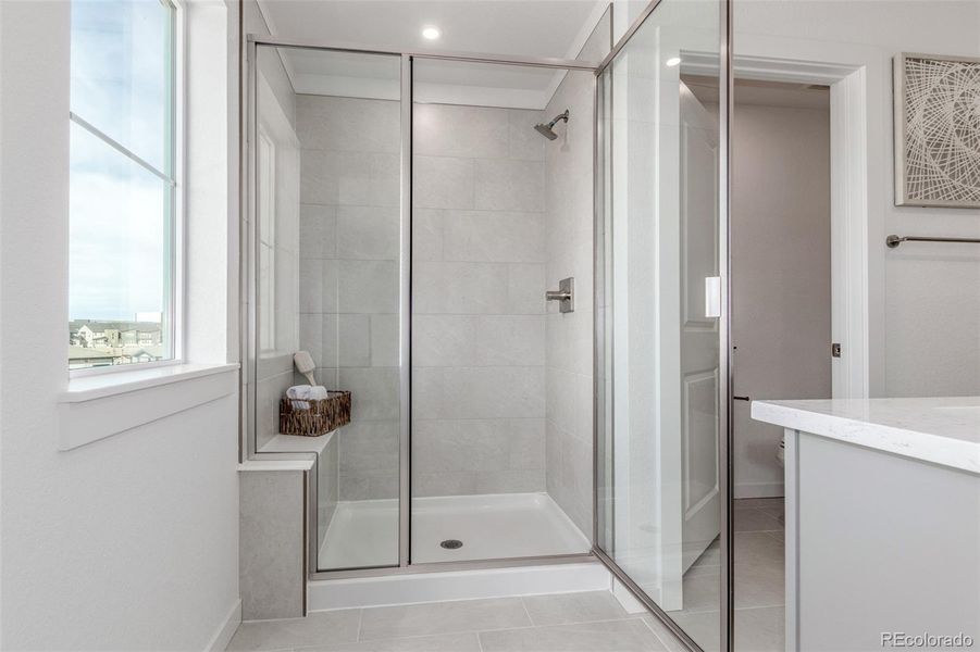 Furnished interior view inside a new home in The Commons at Victory Ridge, Colorado Springs (Image 15).