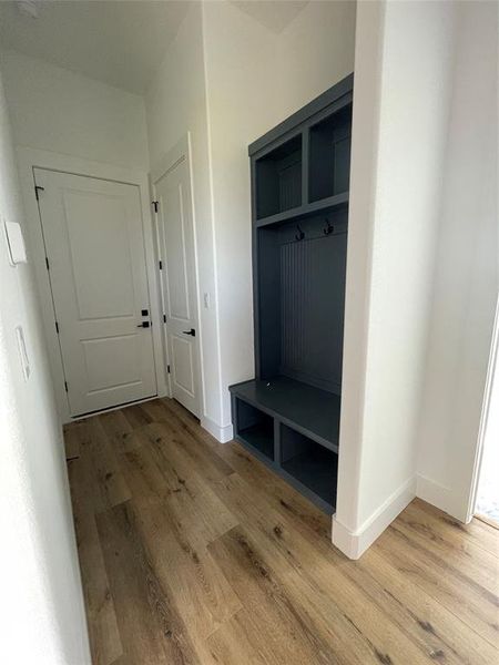 Mudroom with light wood finished floors and baseboards Mudroom with light wood finished floors and baseboards