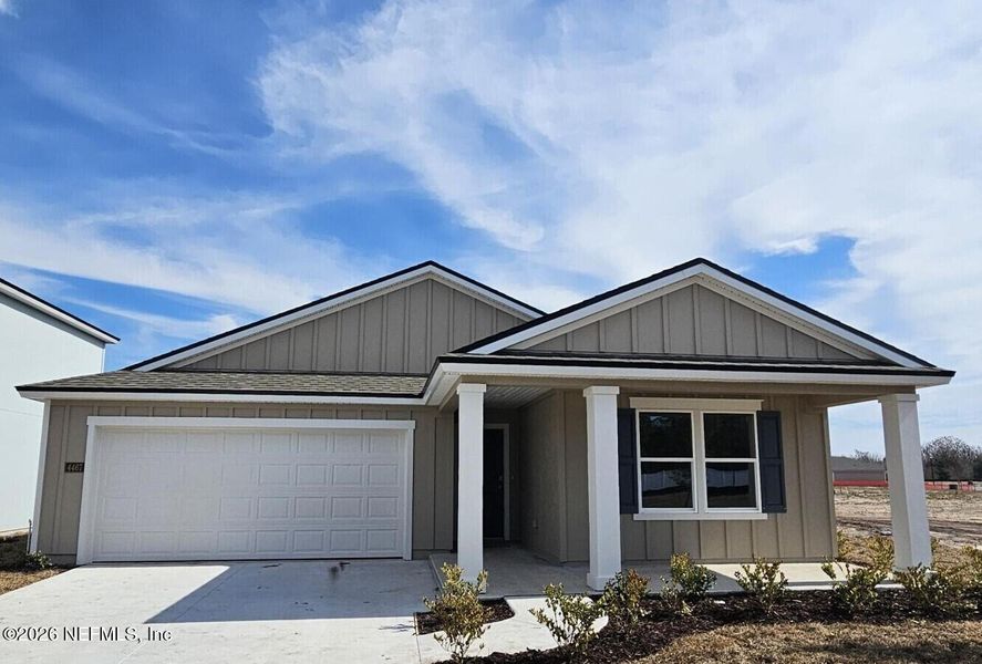 Front exterior of a new home in Rookery, Green Cove Springs, FL, highlighting curb appeal (Image 1). Front exterior of a new home in Rookery, Green Cove Springs, FL, highlighting curb appeal (Image 1).