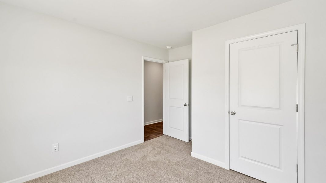 Spacious, unfurnished interior of a new home in Lockwood Landing, Supply (Image 11).