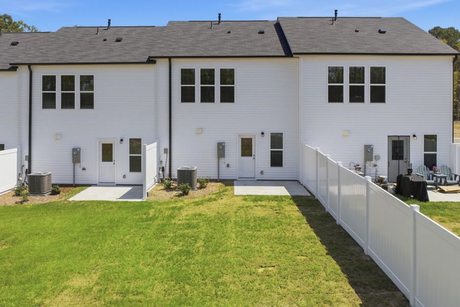 Exterior details and patio area of a home in Carpenter Falls, Durham (Image 4).