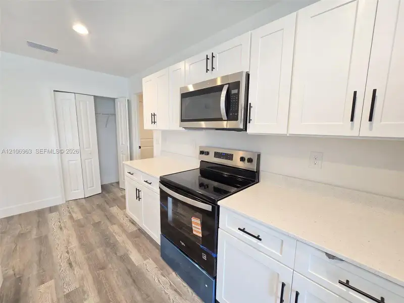 Furnished interior view inside a new home in , Port Charlotte (Image 10).