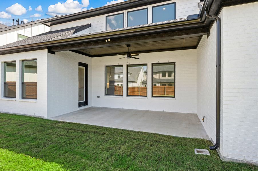 Exterior details and patio area of a home in Parks of Aledo, Aledo (Image 24).