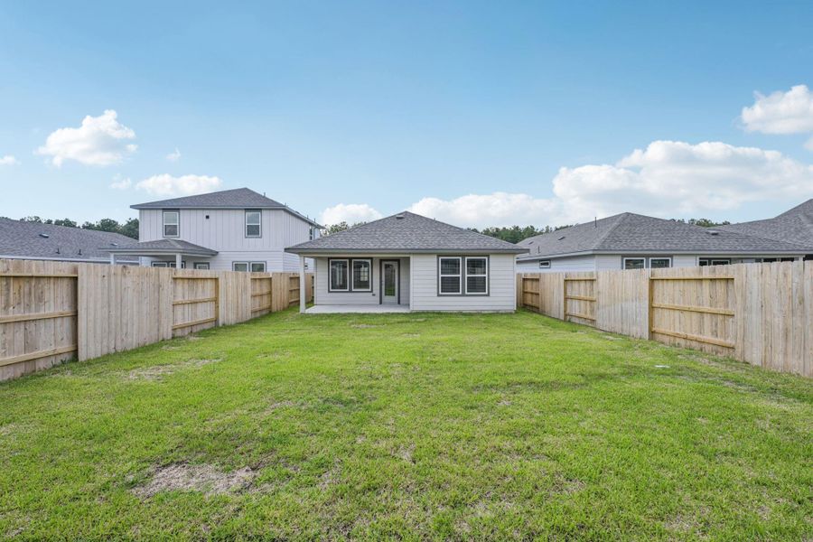 Front exterior of a new home in Landing Meadows - Traditional Series, New Caney, TX, highlighting curb appeal (Image 16). Front exterior of a new home in Landing Meadows - Traditional Series, New Caney, TX, highlighting curb appeal (Image 16).
