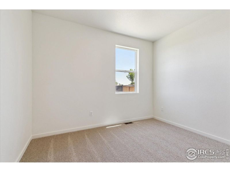 Spacious, unfurnished interior of a new home in Silver Peaks, Lochbuie (Image 13).