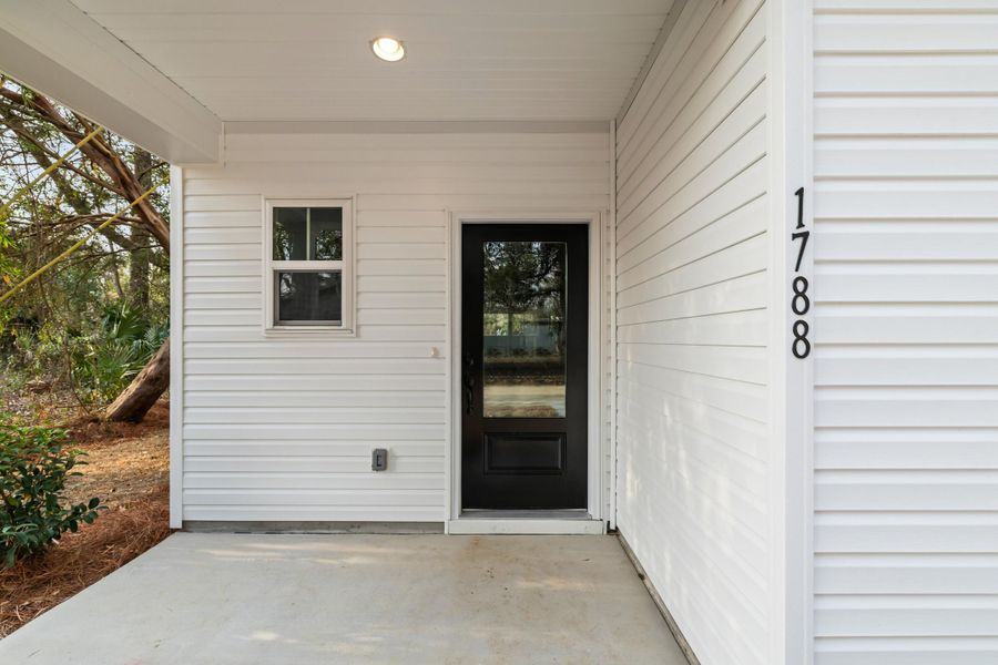 Exterior details and patio area of a home in , Charleston (Image 27). Exterior details and patio area of a home in , Charleston (Image 27).