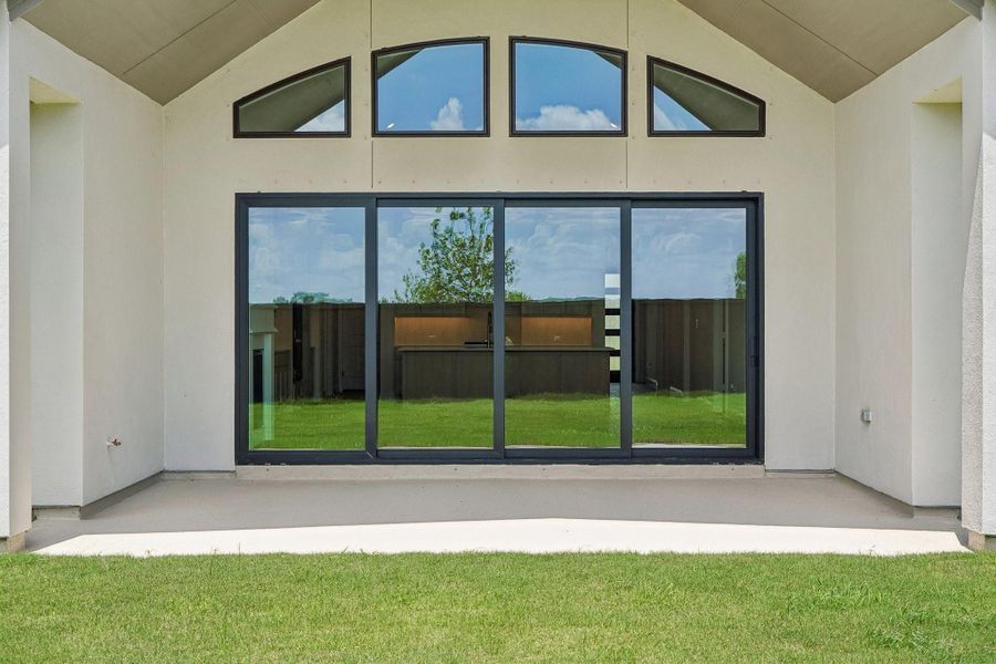 Exterior details and patio area of a home in Del Bello Lakes 60', Manvel (Image 30).