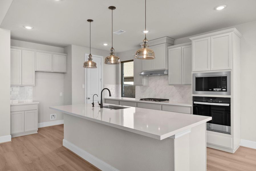 Furnished interior view inside a new home in Coastal Point, League City (Image 12).