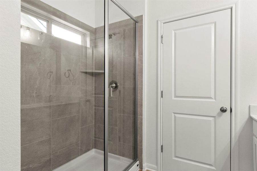 Bathroom with a stall shower Bathroom with a stall shower