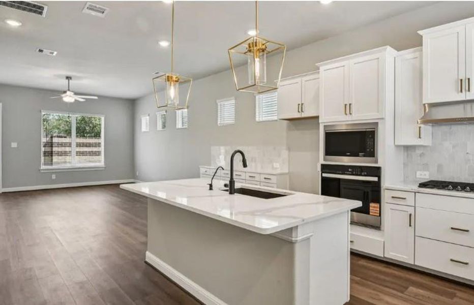 Photo is not of the actual home, but is an inspirational photo of builder’s model home and may depict options, furnishings, and/or decorator features that are not included Photo is not of the actual home, but is an inspirational photo of builder’s model home and may depict options, furnishings, and/or decorator features that are not included