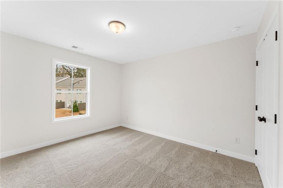 Spacious, unfurnished interior of a new home in Cherokee Township, Acworth (Image 25).