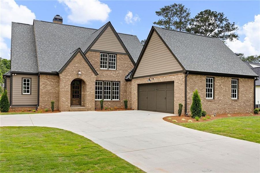 Front exterior of a new home in , Carrollton, GA, highlighting curb appeal (Image 31).