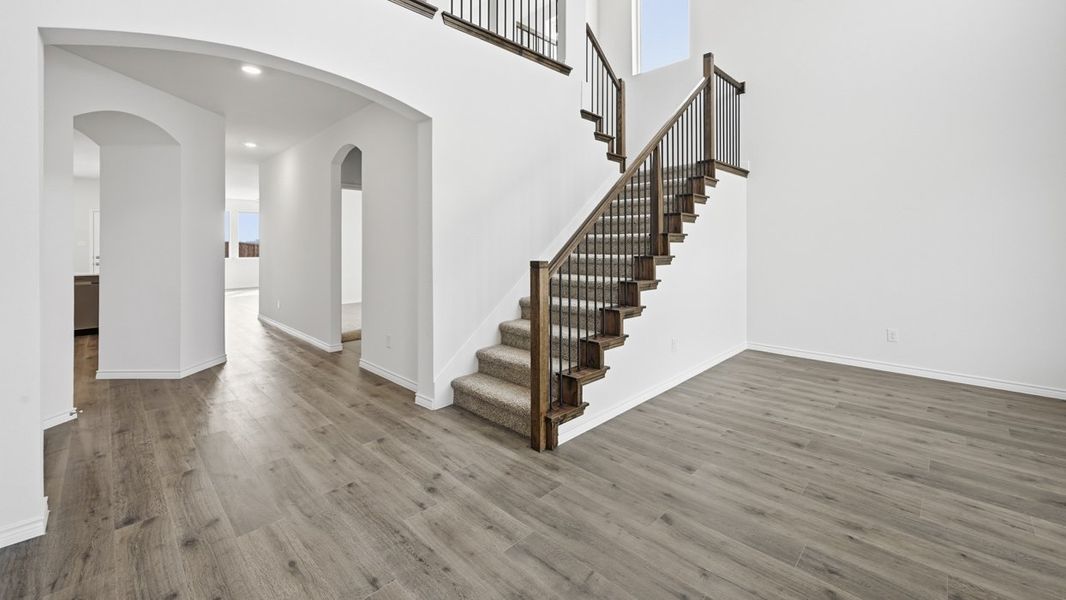 Representative unfurnished interior of a home built from the H204 Medbourne by D.R. Horton in Lilybrooke at Legacy Hills, Celina (Image 10).