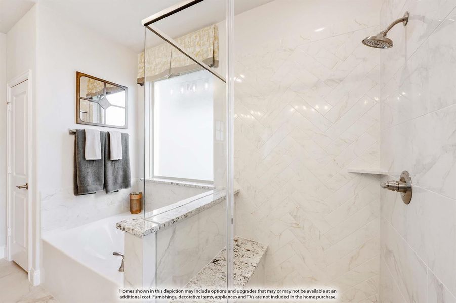 Bathroom with walk-in shower, marble tile walls, soaking tub, and glass partition Bathroom with walk-in shower, marble tile walls, soaking tub, and glass partition