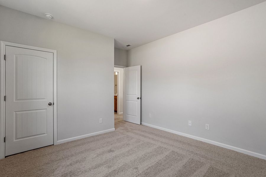 Spacious, unfurnished interior of a new home in Ovation at Sweetbrier, Durham (Image 28).