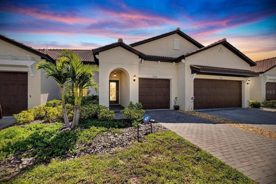 Front exterior of a new home in Southshore Bay Active Adult, Wimauma, FL, highlighting curb appeal (Image 26).