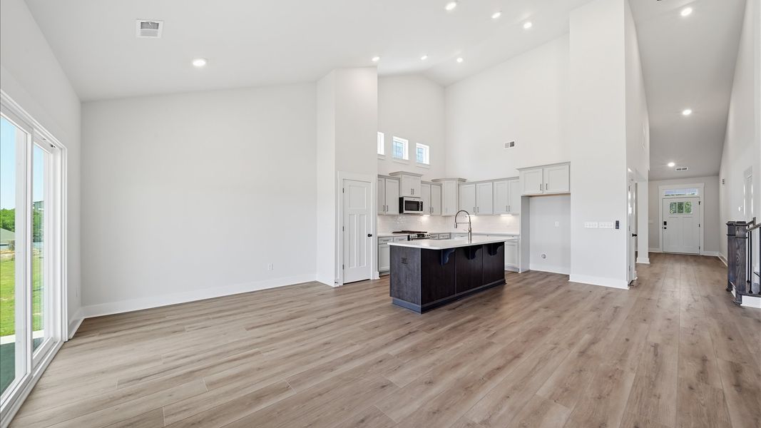 This casual dining area, right off the kitchen, features a seamless layout that makes mornings feel easy and welcoming