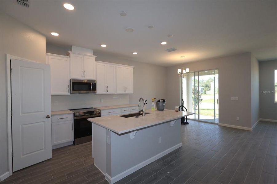 Furnished interior view inside a new home in Bay Lake Farms, St. Cloud (Image 11).