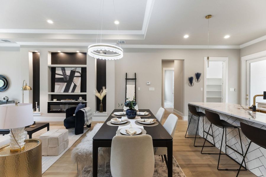 Elegant dining space flows into a welcoming living area, perfect for entertaining.