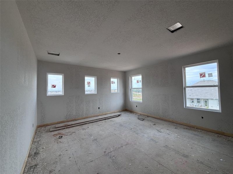 Spacious, unfurnished interior of a new home in The Colony 45s, Bastrop (Image 20).