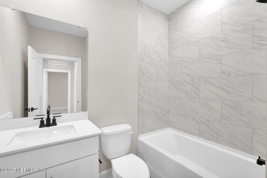 Furnished interior view inside a new home in Jennings Farm, Middleburg (Image 3).