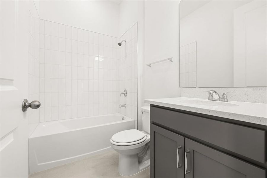 Furnished interior view inside a new home in Serenade at Ovation, Winter Garden (Image 12).