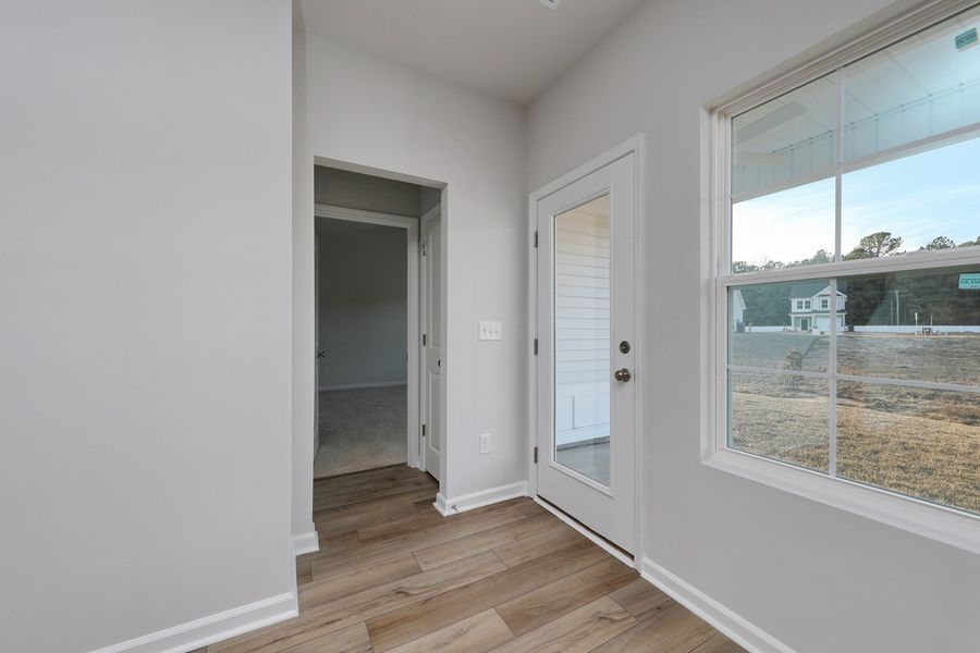 Spacious, unfurnished interior of a new home in Hainer Place, Conway (Image 26).
