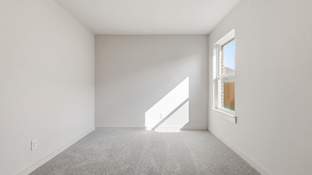 Furnished interior view inside a new home in Patriot Estates, Venus (Image 13).