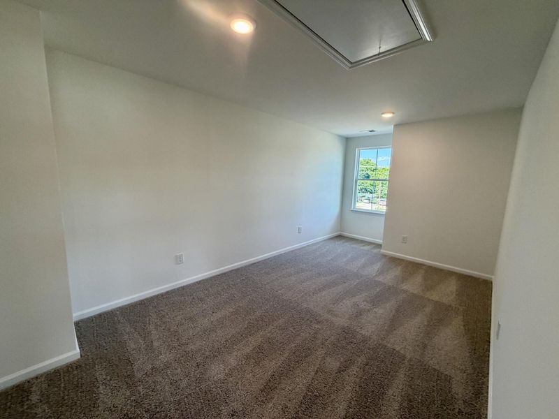 Spacious, unfurnished interior of a new home in Bellevue Townhomes, Greenville (Image 13).