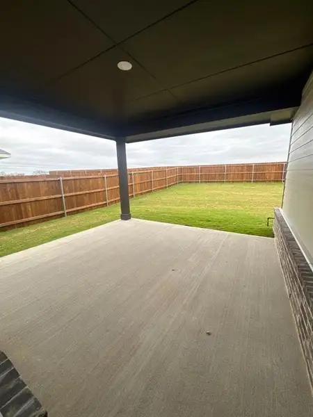 Exterior details and patio area of a home in Cedar Ridge Estates, Anna (Image 3).