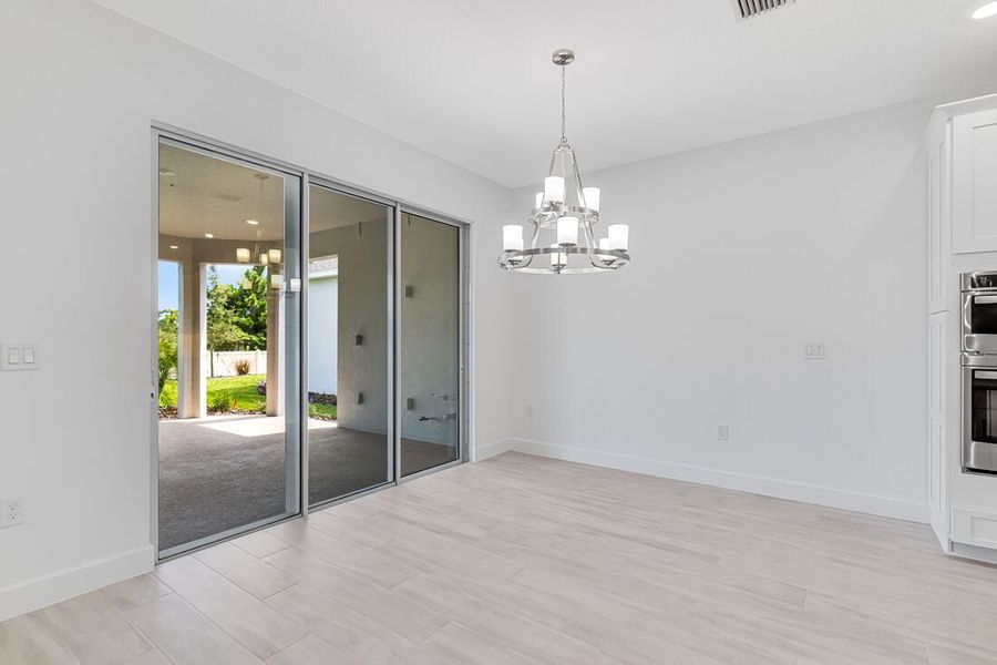 Representative unfurnished interior of a home built from the Azzurro by Taylor Morrison in Esplanade at Center Lake Ranch, St. Cloud (Image 11).