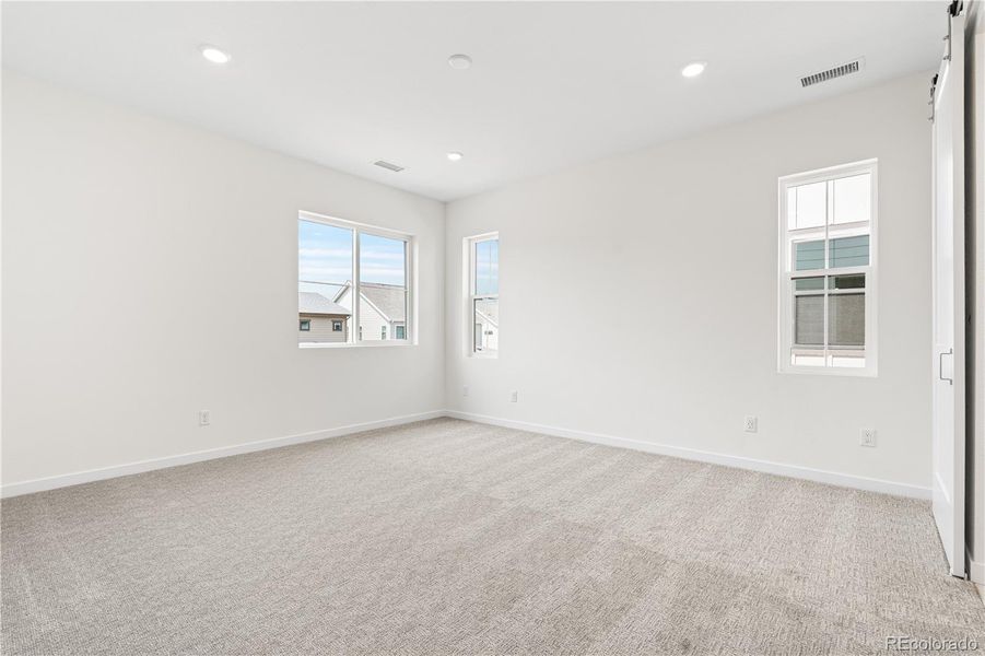 Spacious, unfurnished interior of a new home in Harmony at Solstice, Littleton (Image 22).