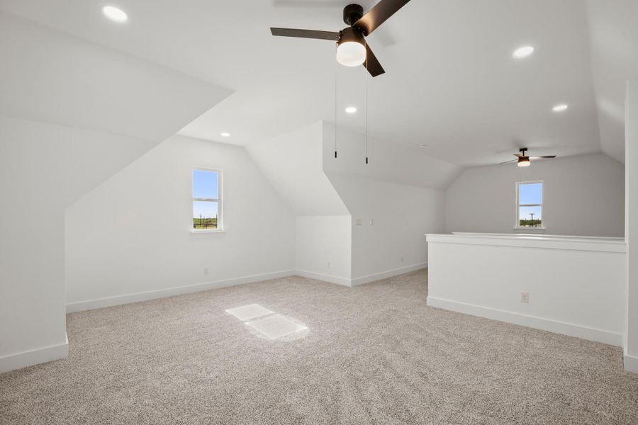 Bright and inviting, this generously sized loft offers abundant natural light and soft carpeting. Bright and inviting, this generously sized loft offers abundant natural light and soft carpeting.