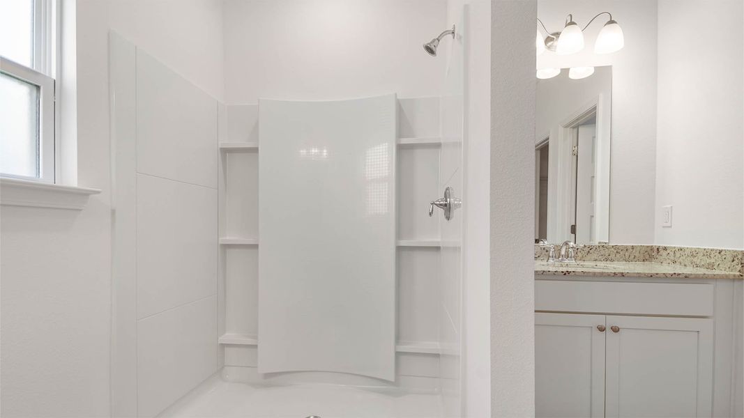 Representative furnished interior of a home built from the Aspen by D.R. Horton in Owl's Head East, Freeport (Image 15).