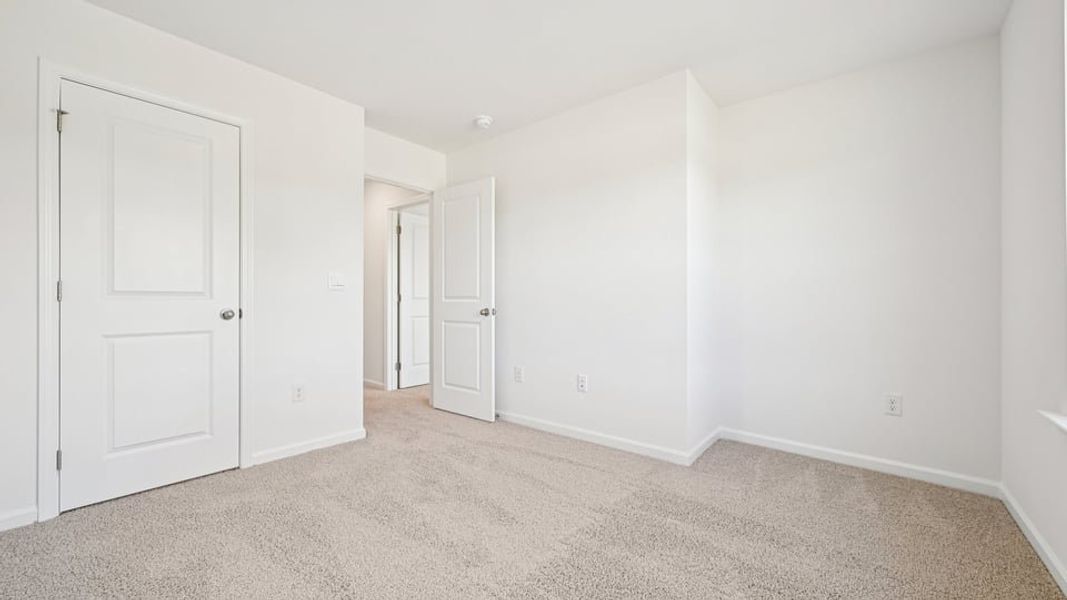 Spacious, unfurnished interior of a new home in Chapel Townes, Raleigh (Image 23).