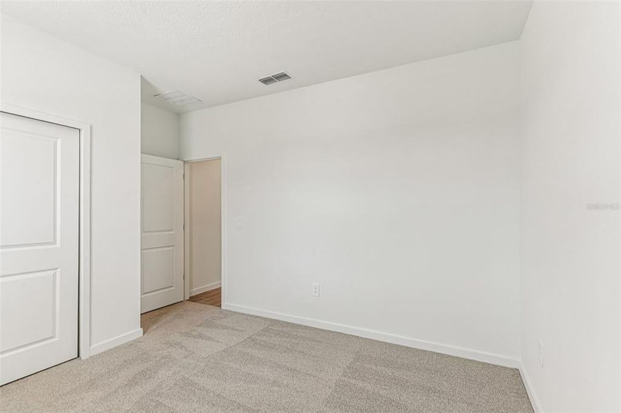 Spacious, unfurnished interior of a new home in Colbert Landings, Palm Coast (Image 15).