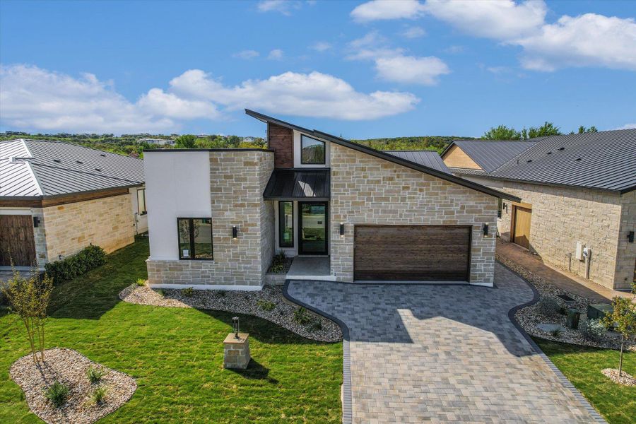 Front exterior of a new home in , Horseshoe Bay, TX, highlighting curb appeal (Image 24).