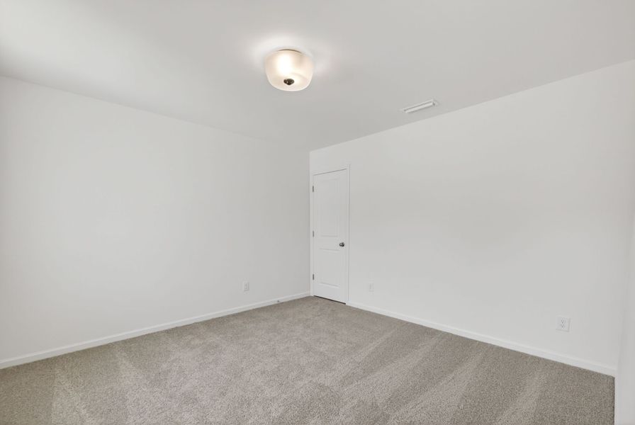 Spacious, unfurnished interior of a new home in Nathans Ridge, Lillington (Image 25).